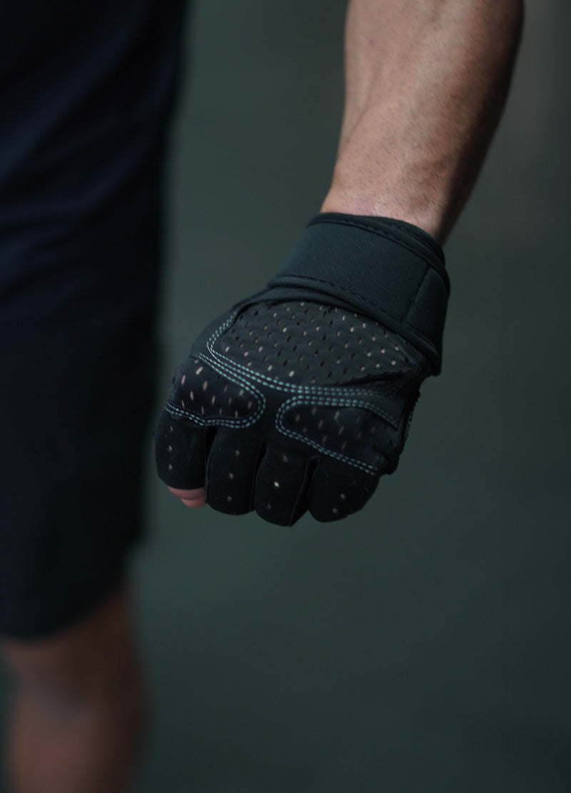 a close up of a person wearing a pair of gloves