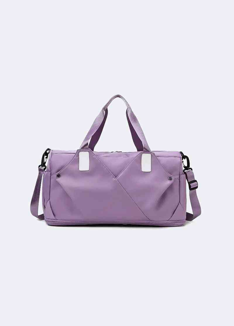 a purple bag with straps and a white tag